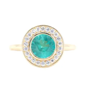 0.94ct Round Neon Green Emerald With Bezel Set Diamond Halo In 18k Yellow Gold