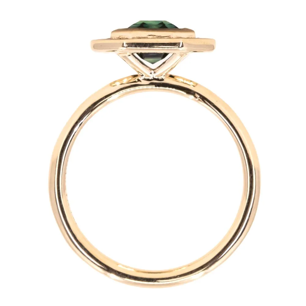 2.05ct Emerald cut Sapphire With Bezel Set Diamond Halo In 14k Yellow Gold