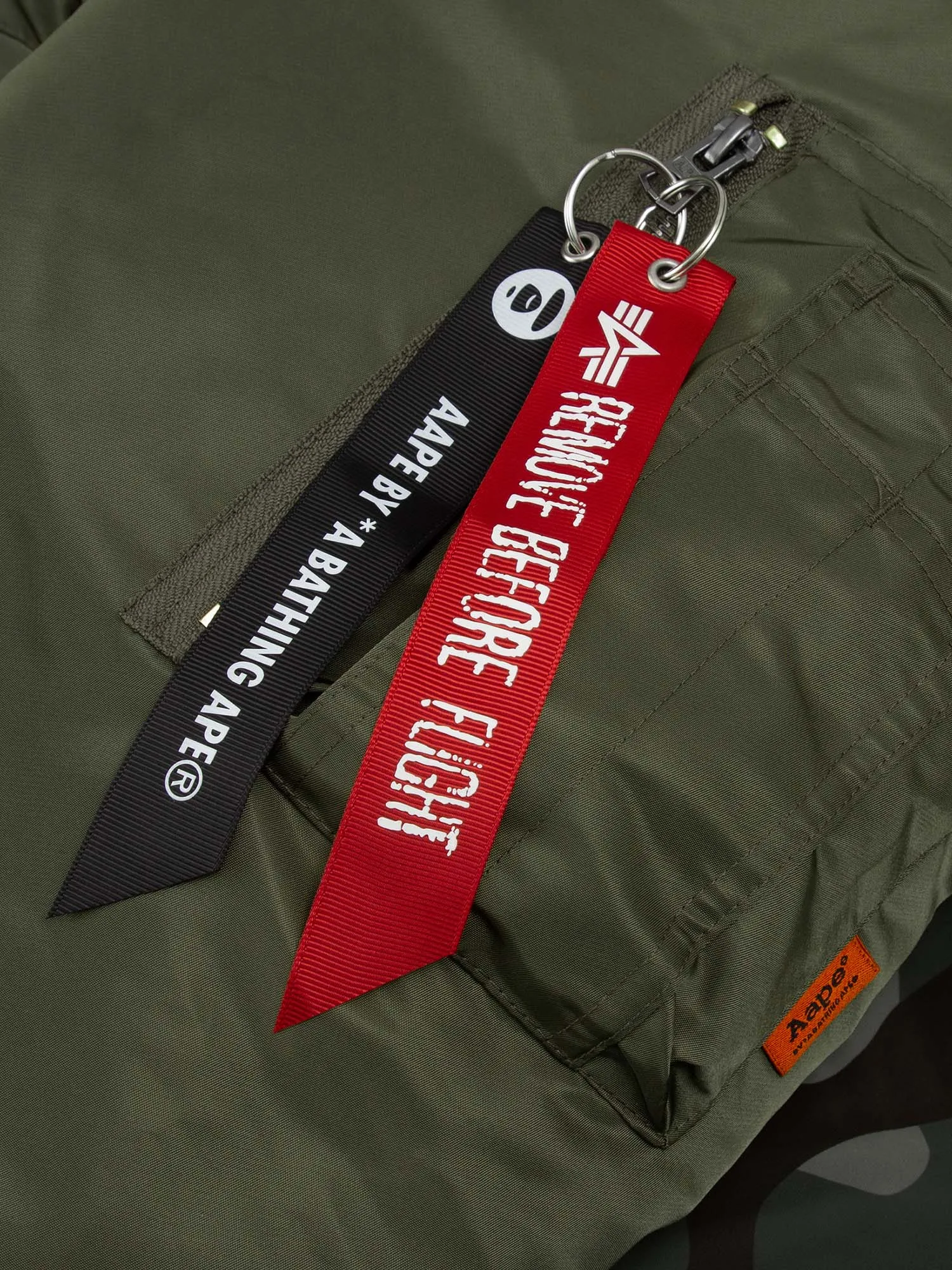 AAPE X ALPHA REVERSIBLE MA-1 DOWN JACKET