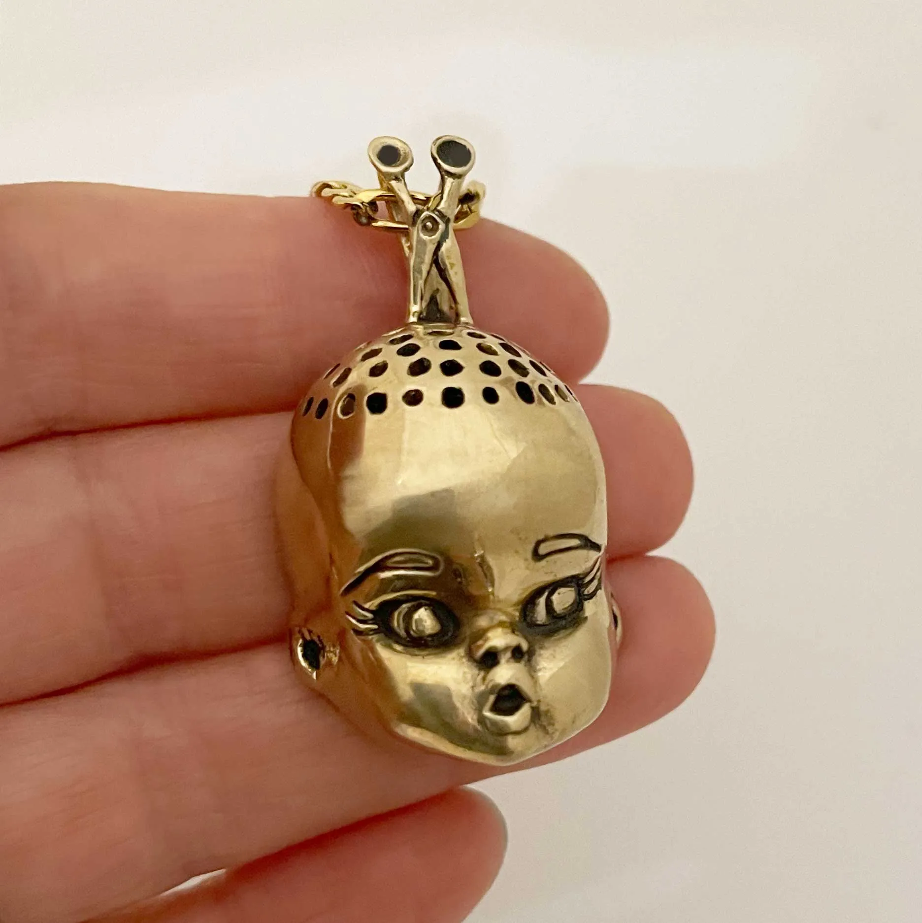 Baldie Doll Head Necklace