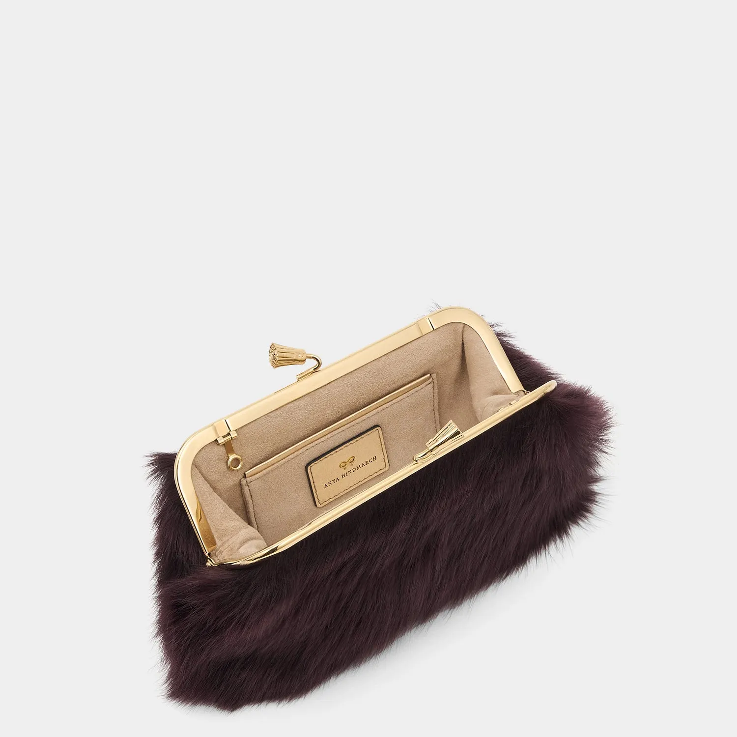 Maud Shearling Tassel Clutch