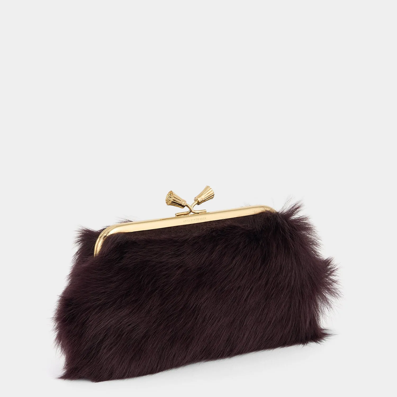 Maud Shearling Tassel Clutch