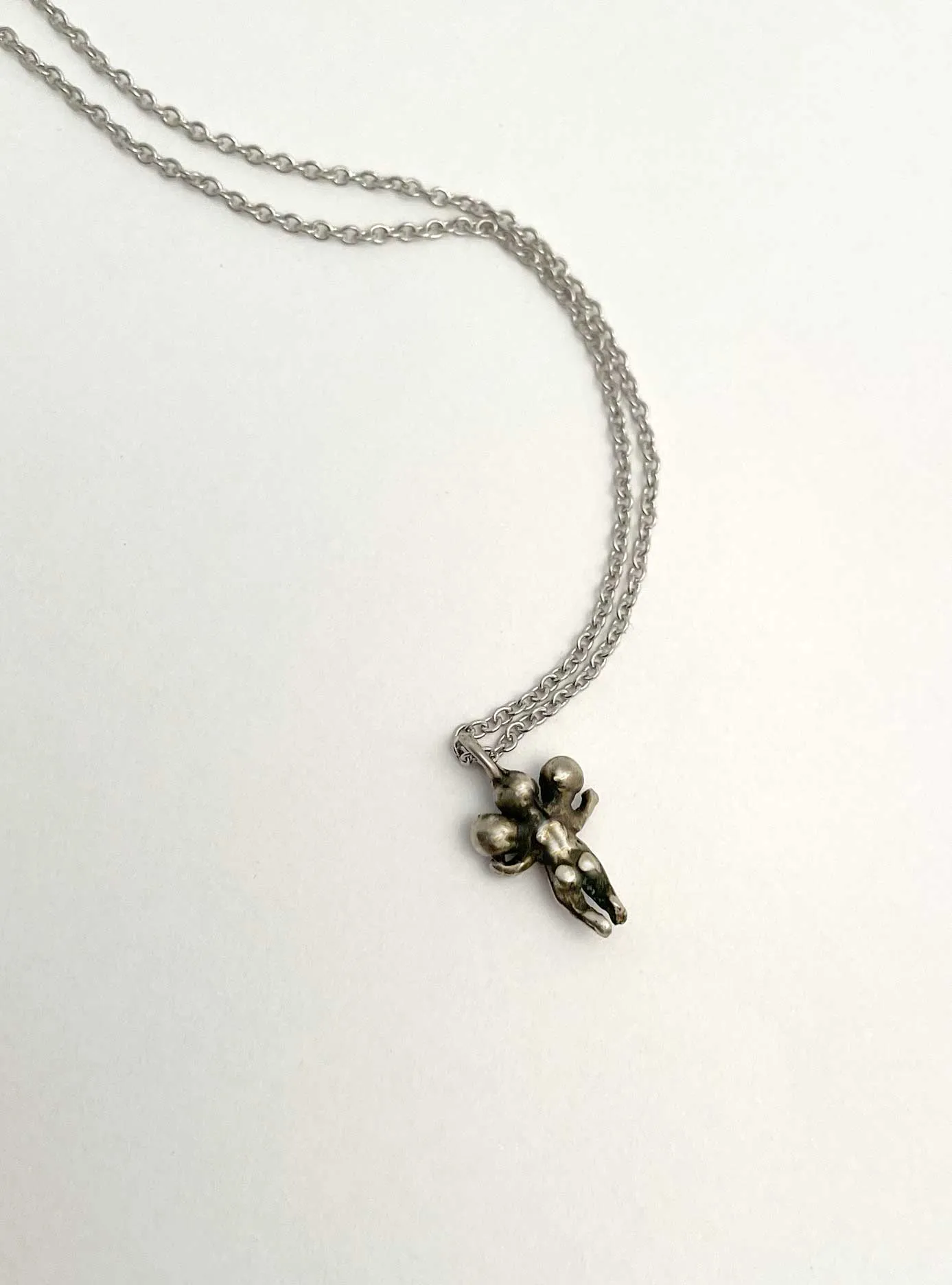 Tiny Three Headed Baby Necklace