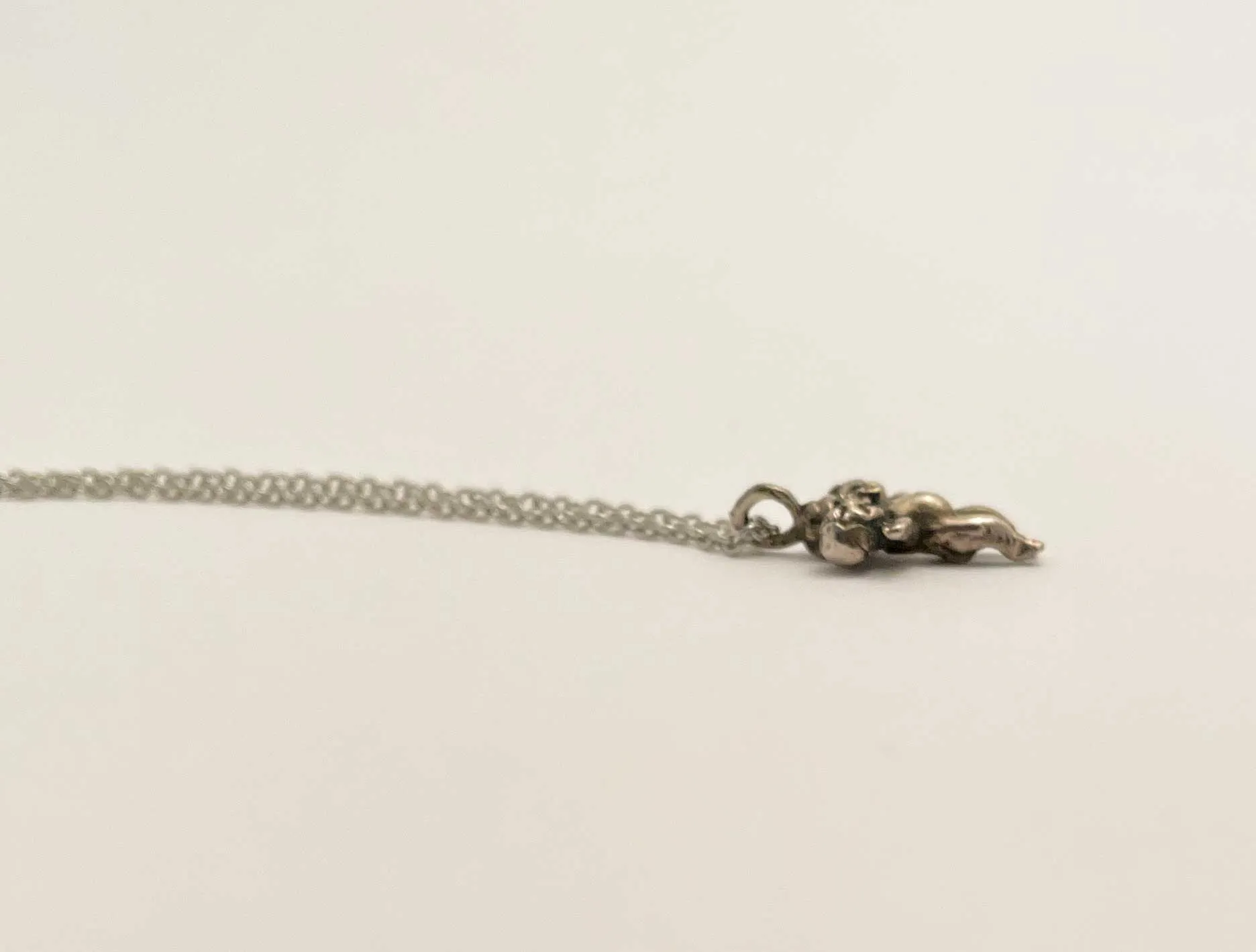 Tiny Three Headed Baby Necklace