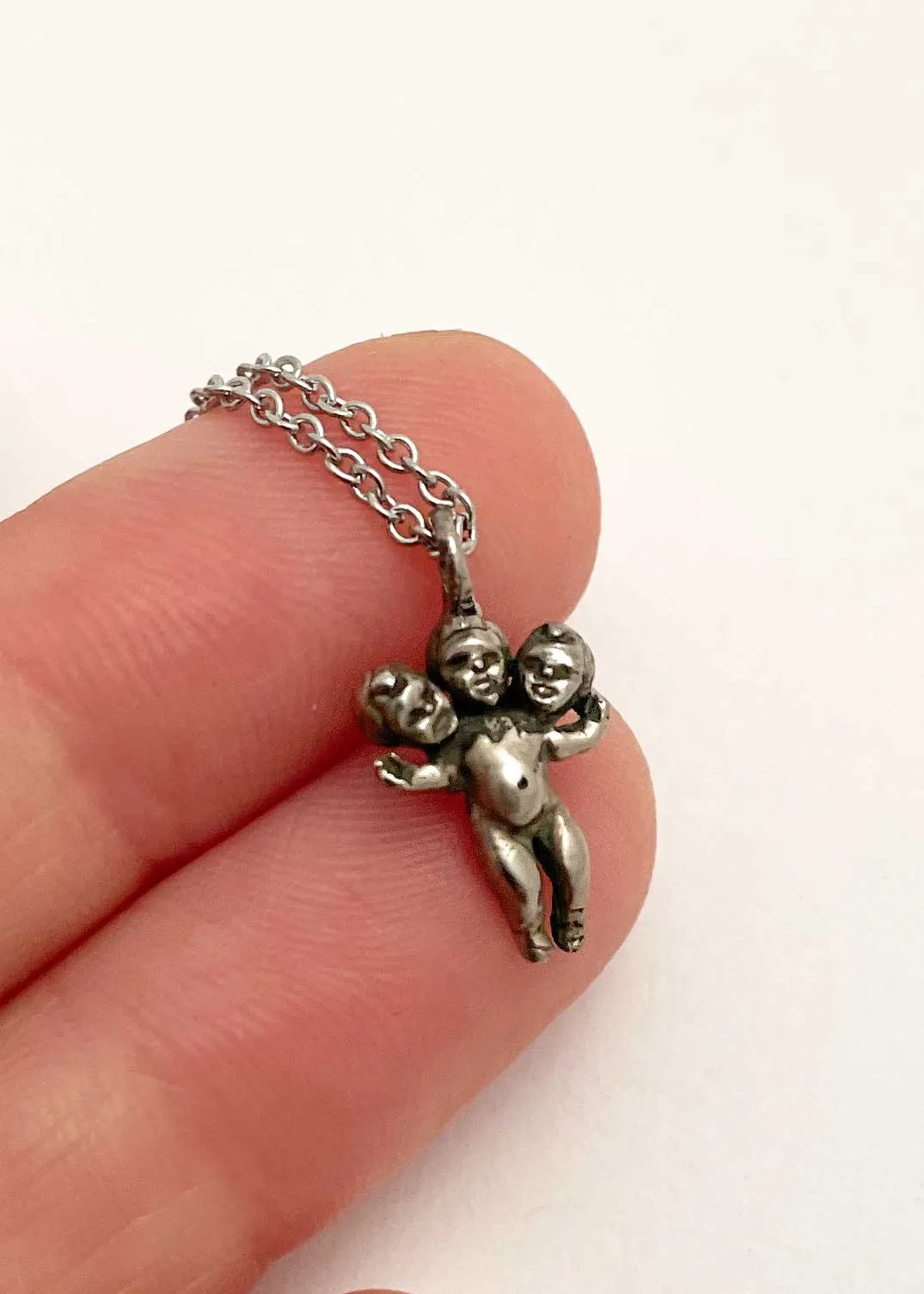 Tiny Three Headed Baby Necklace